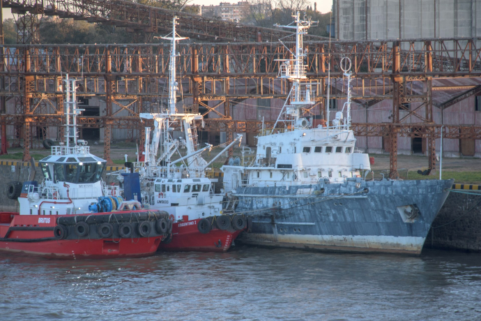 a couple of boats that are sitting in the water